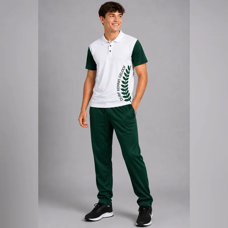White and green branded polo with casual trousers